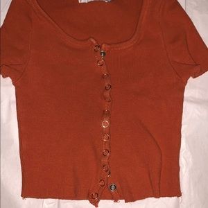 Adika xs burnt orange snap front crop top